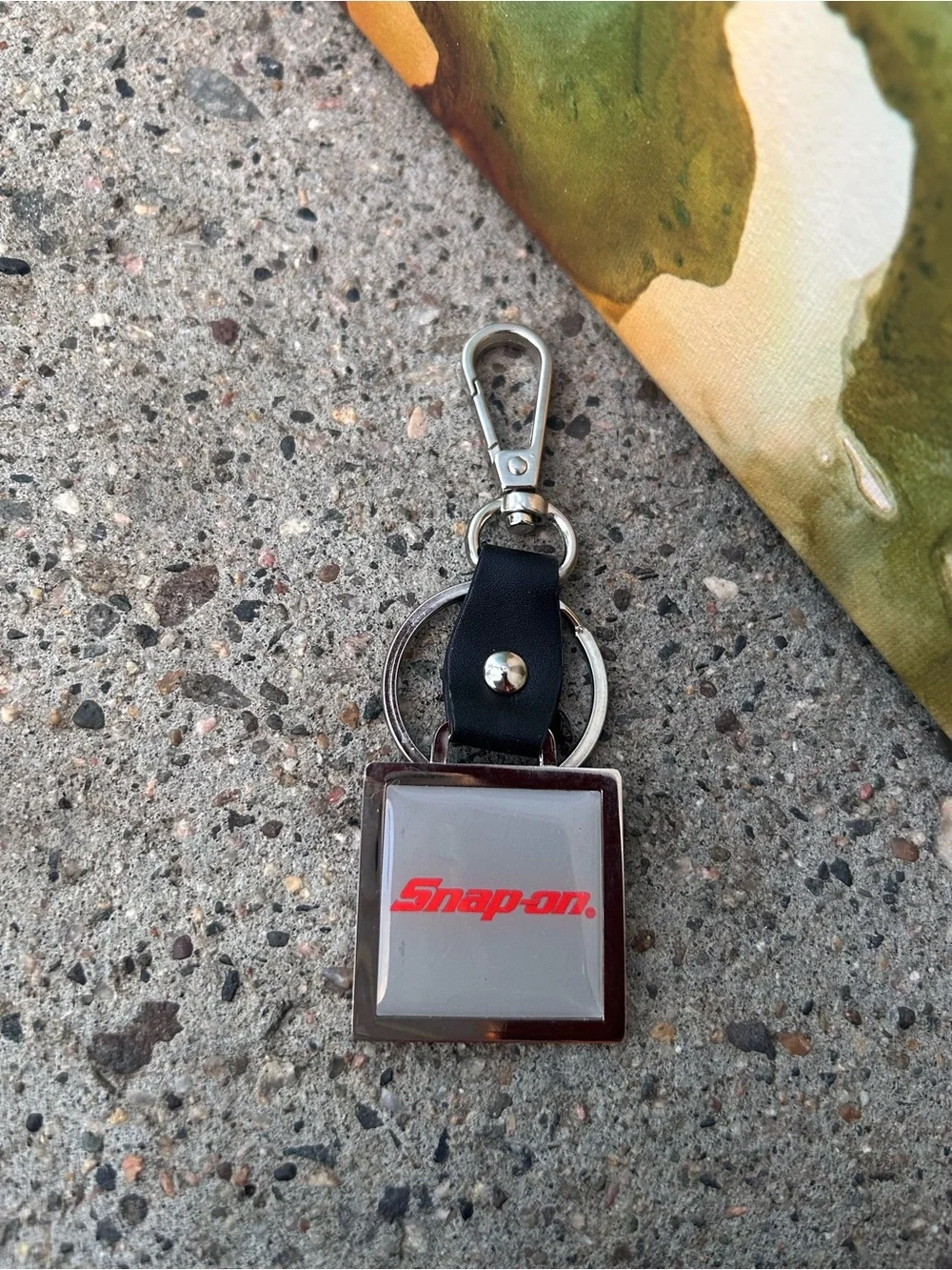 Snap-on Logo Keychain in Silver and Black with Red Logo